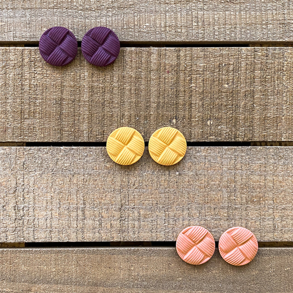 Family of plum, mustard and salmon colored button stud earrings handmade from polymer clay