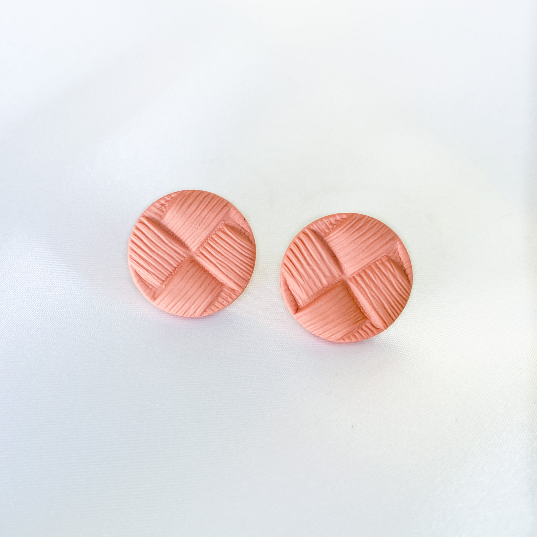 Salmon colored button stud earrings handmade from polymer clay